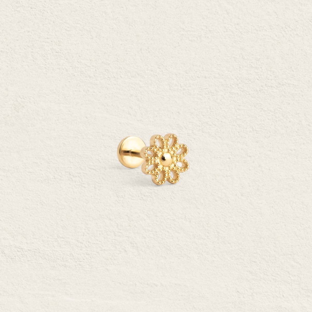 Piercing threadless en plaqué or motif fleur