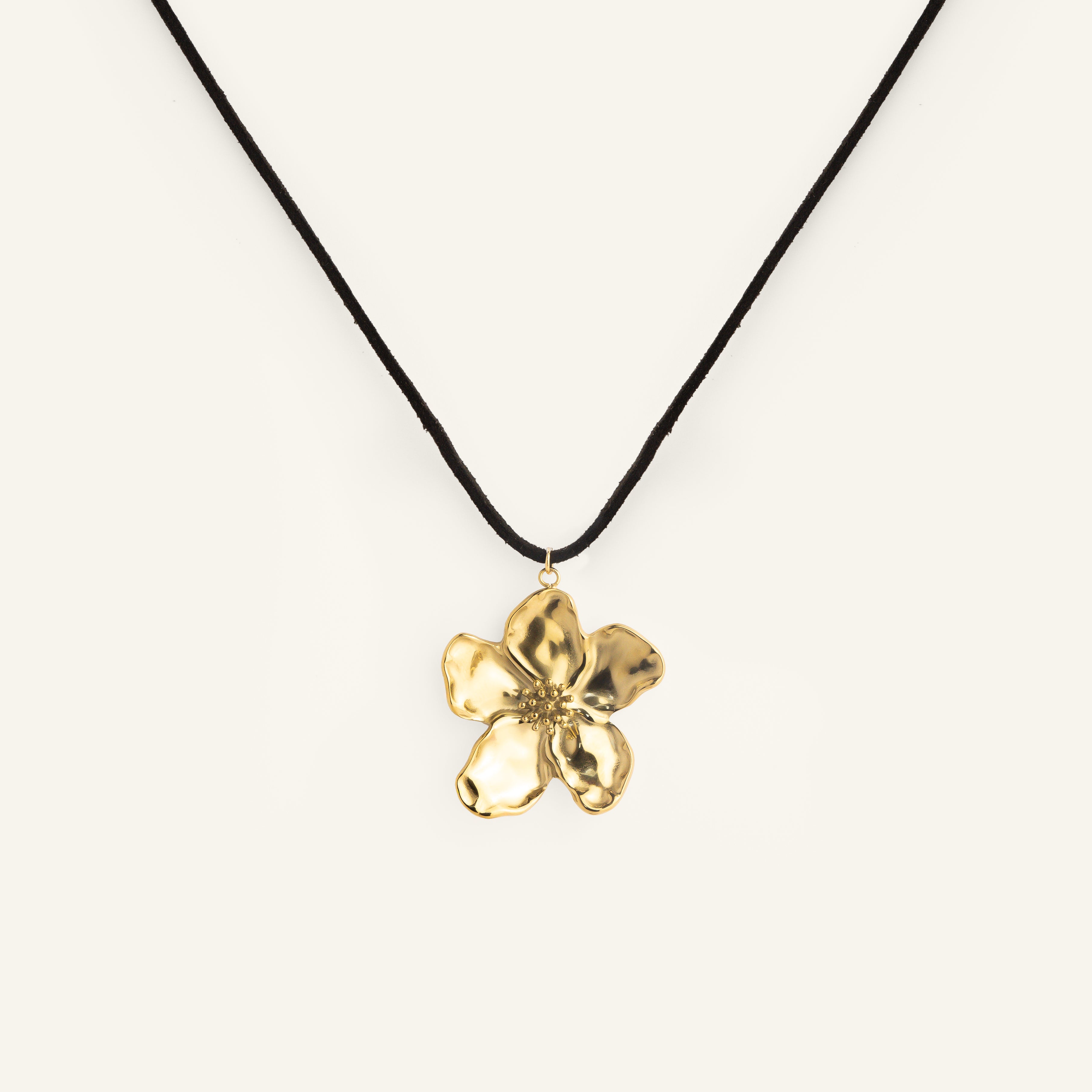 Collier fleur acier inoxydable doré sur cordon