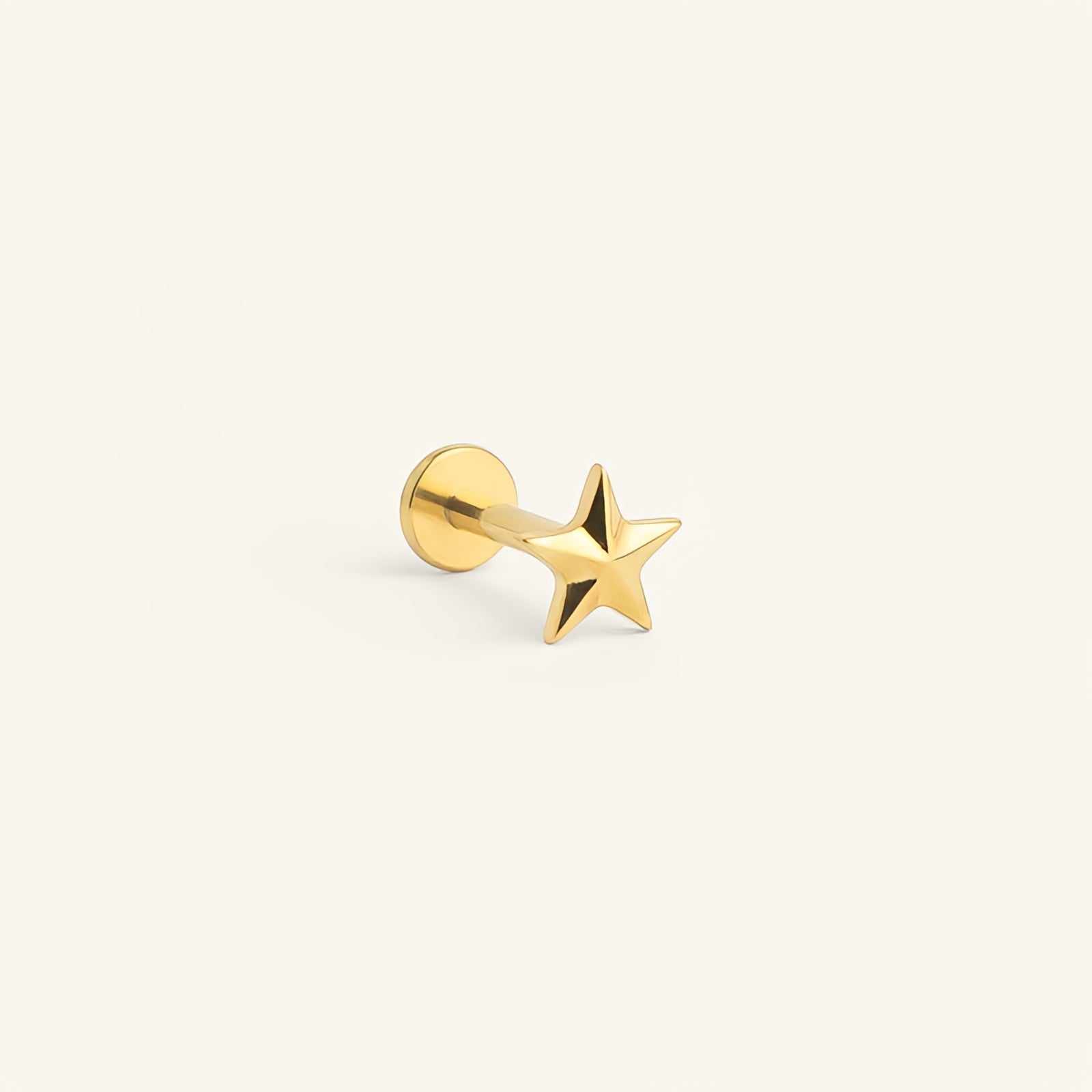Piercing étoile titane doré