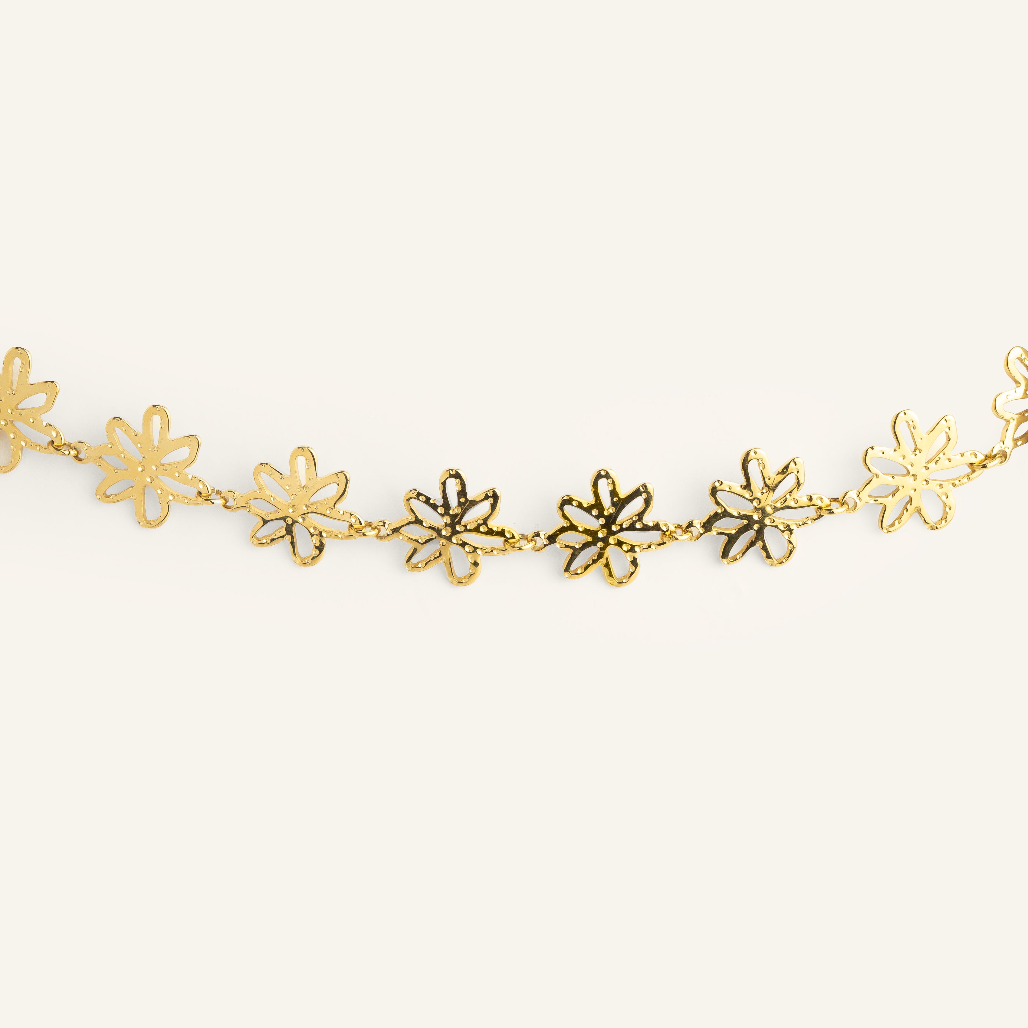 Bracelet fleur acier inoxydable doré