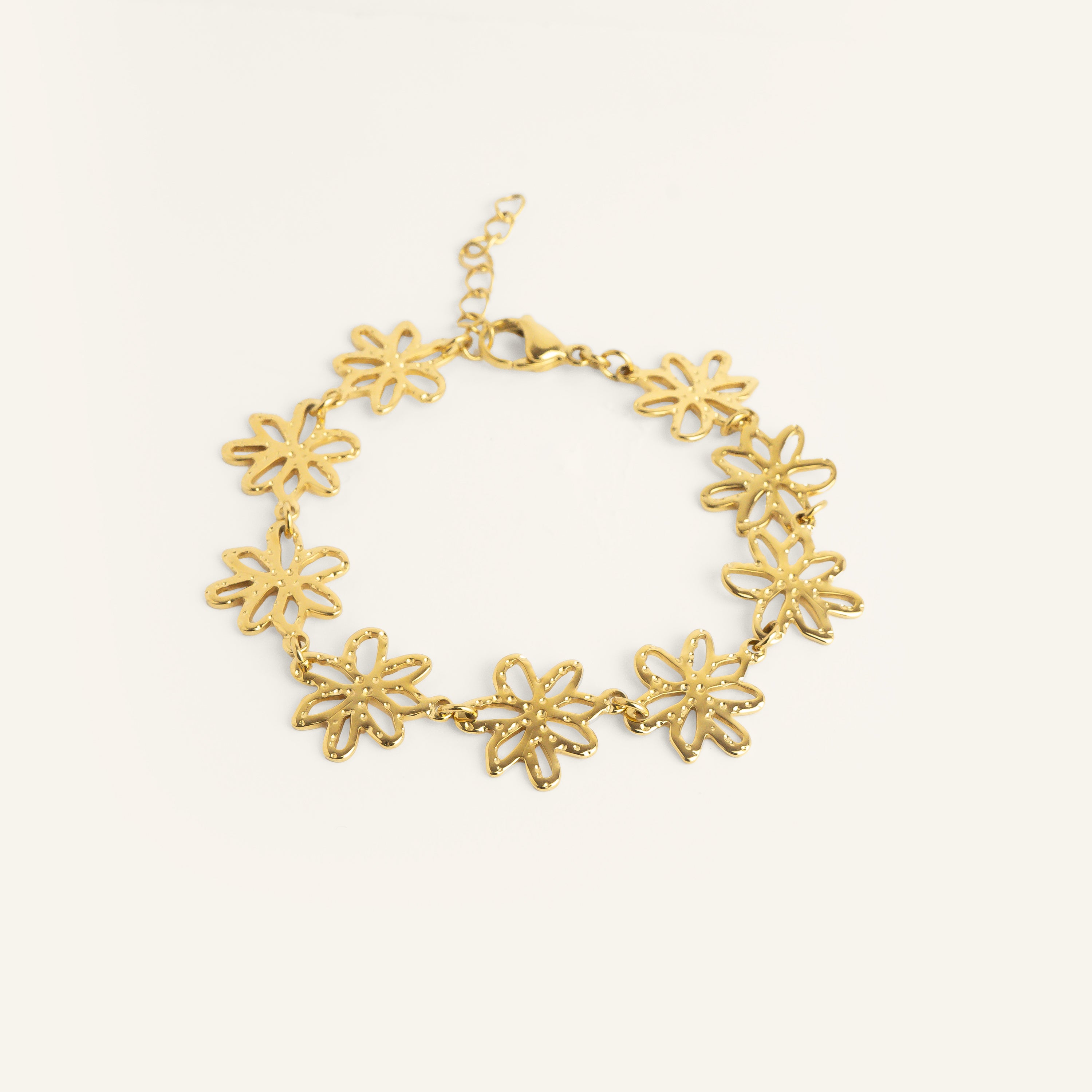 Bracelet fleur acier inoxydable doré