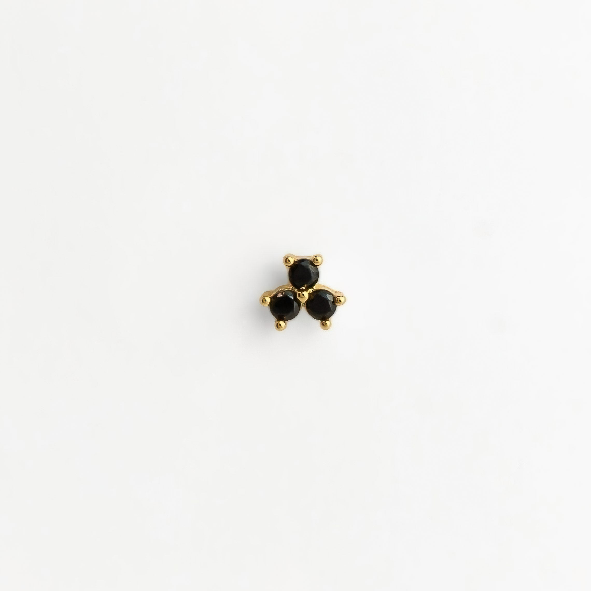 Piercing acier inoxydable doré pierres noirs