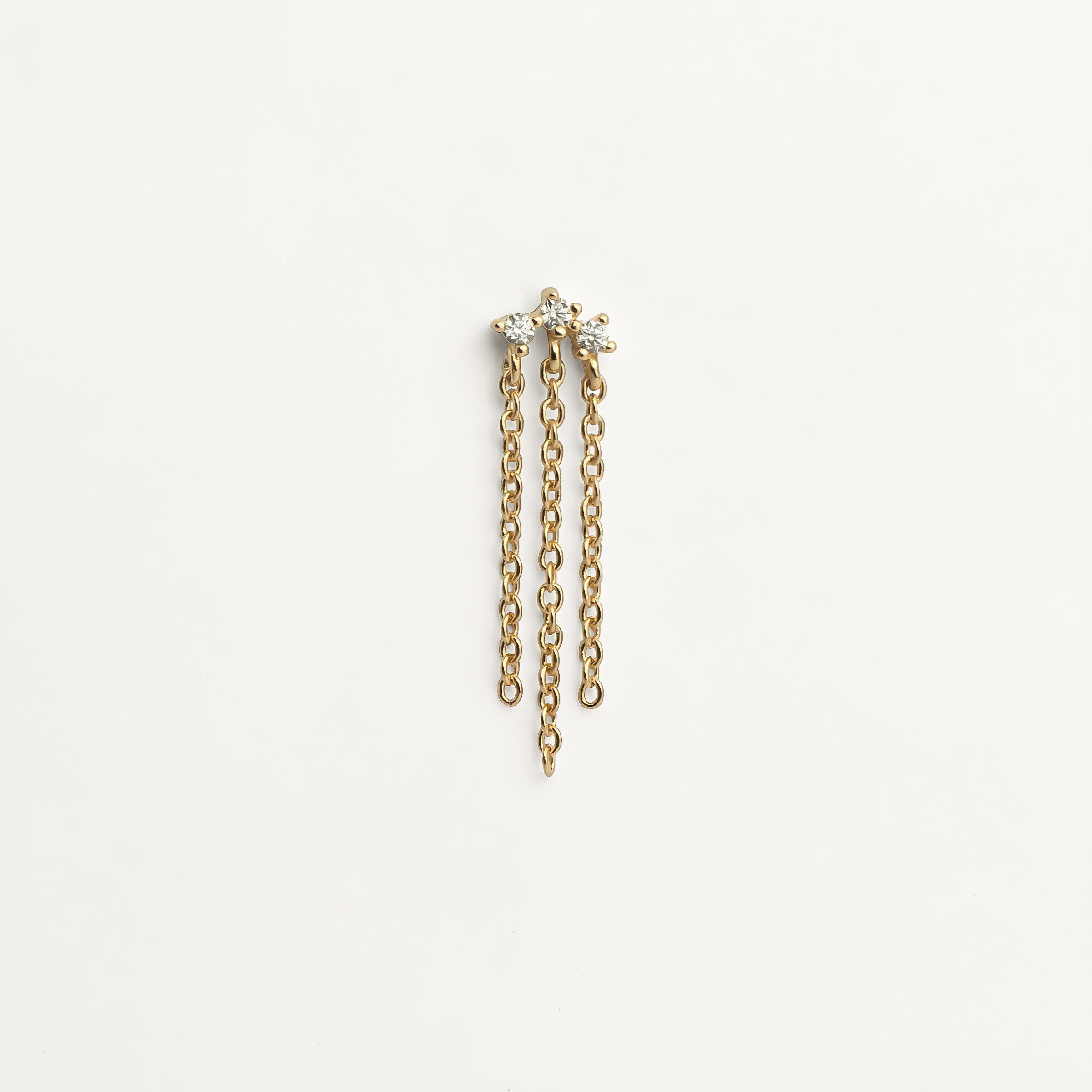 Boucle pendante triple chaîne plaqué or sertie de 3 pierres zircons blanches