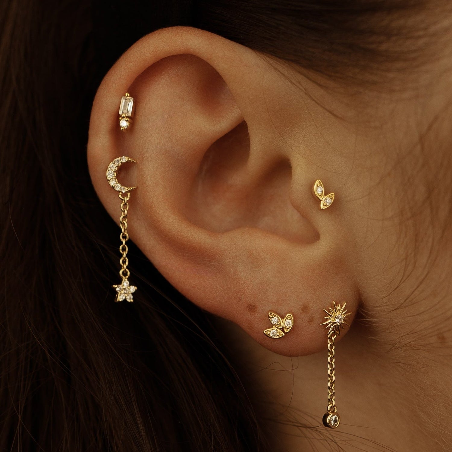 Composition de piercings acier inoxydable doré