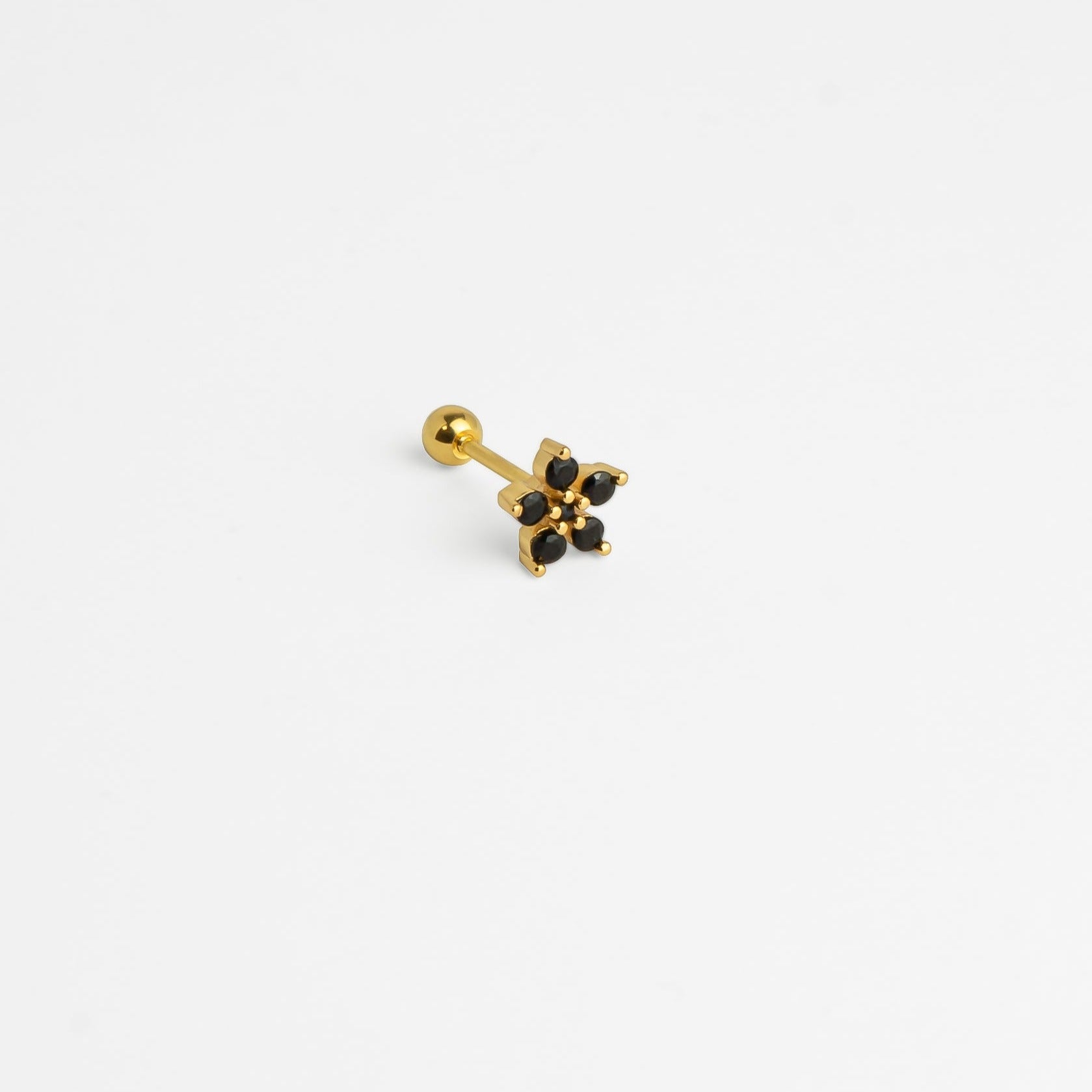 Piercing acier inoxydable doré pierre zircons noirs