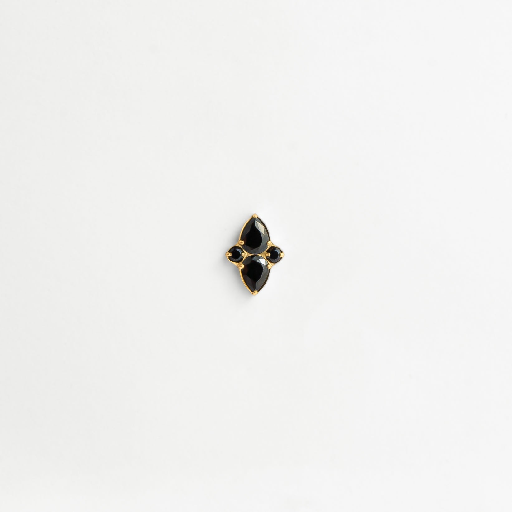 Piercing titane doré pierre noire