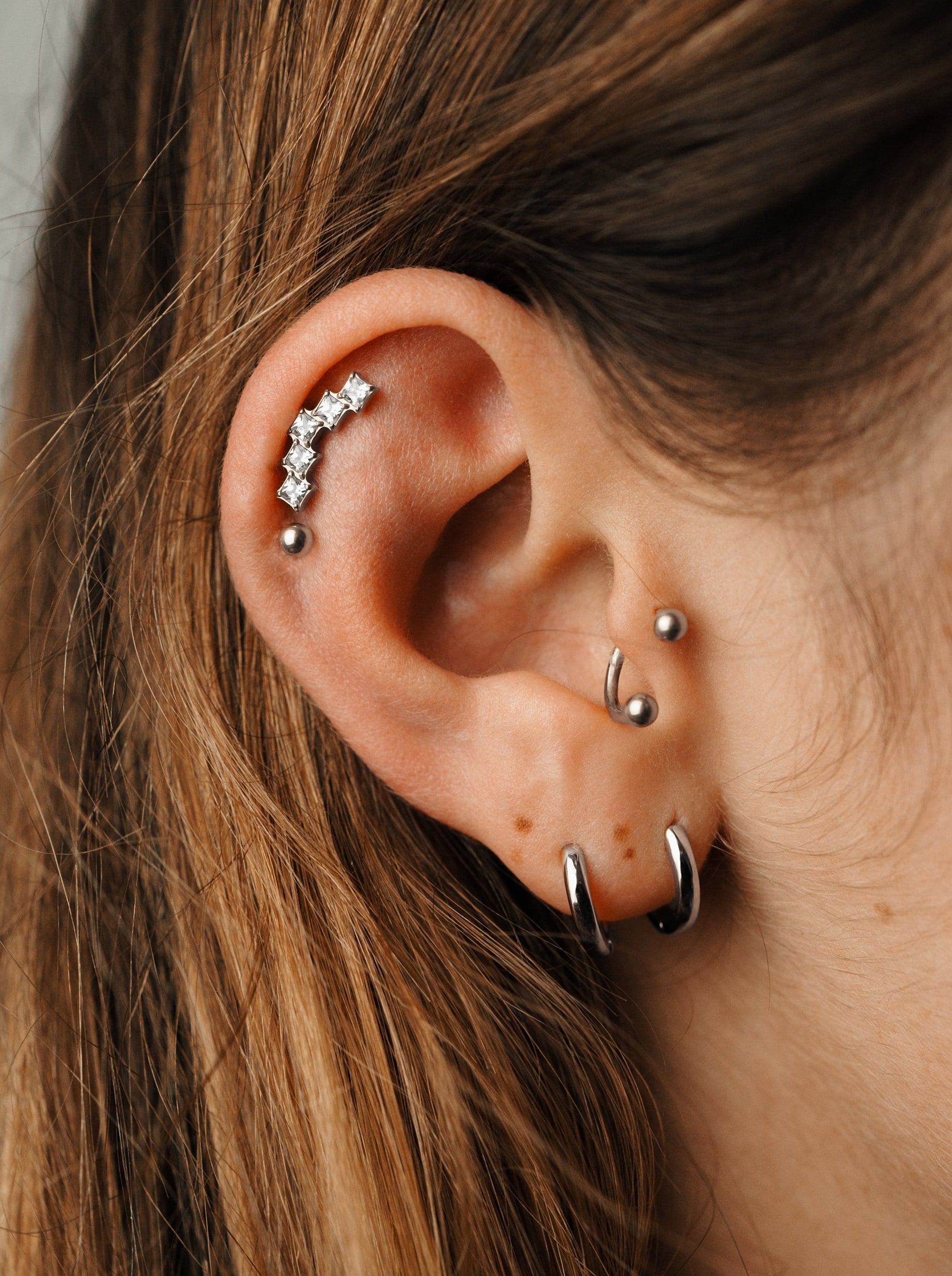Titanium piercing - Apis