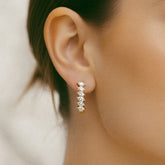 Créoles femme en plaqué or serties de plusieurs pierres de zircons blancs 