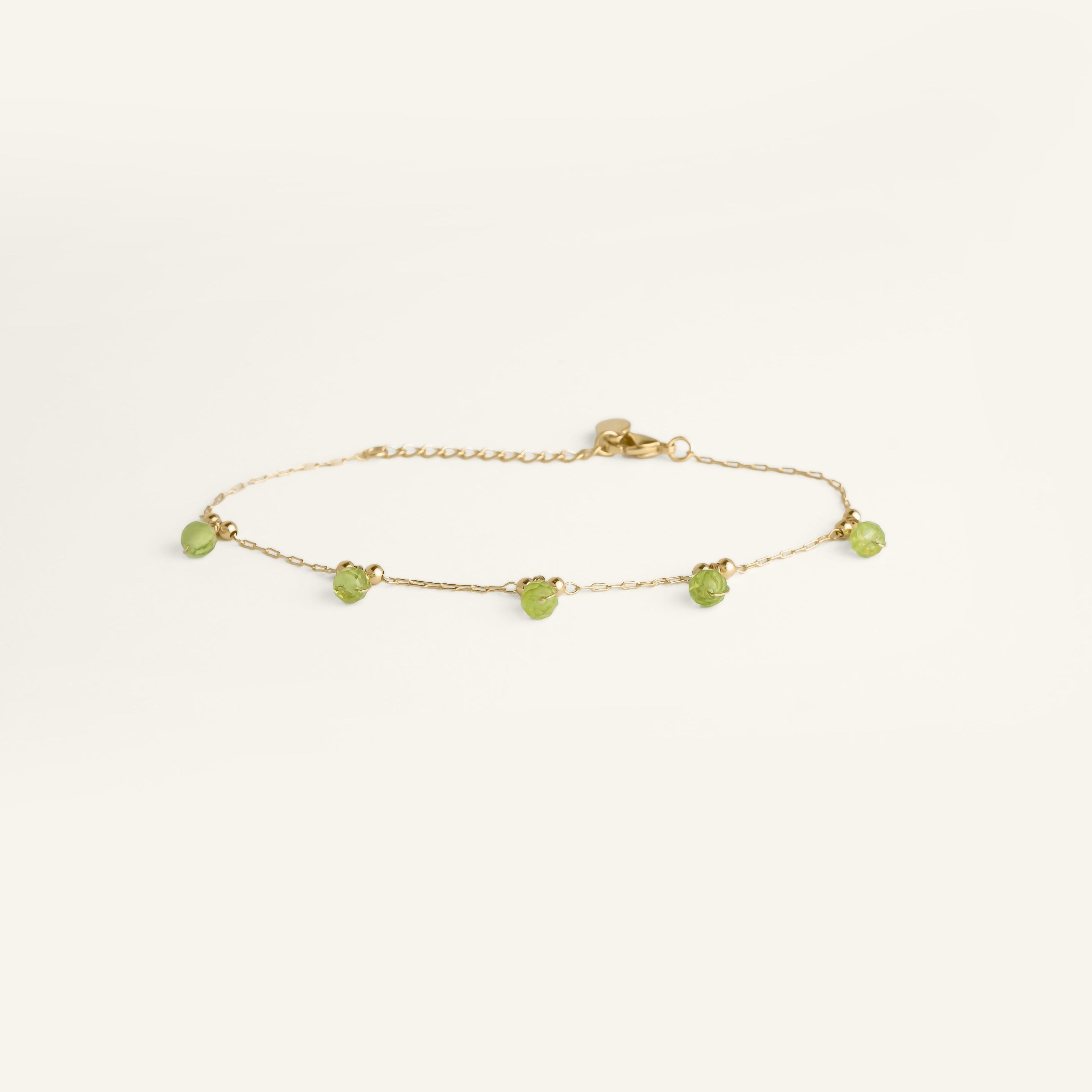 Bracelet fin femme plaqué or pierres vertes