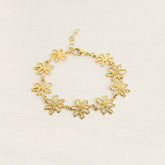 Bracelet fleur Linda en acier inoxydable doré à maillons fleurs