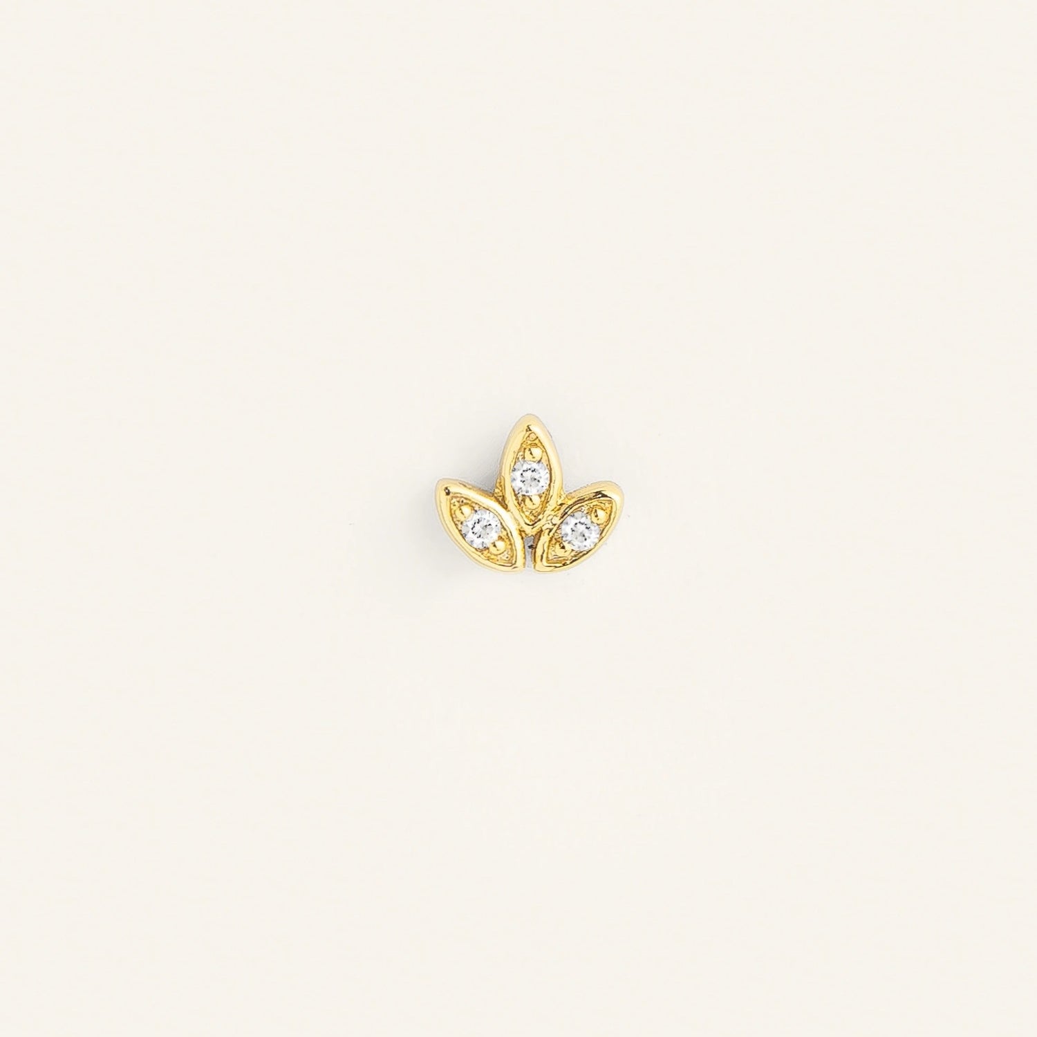 Piercing fleur acier inoxydable doré zircons blancs