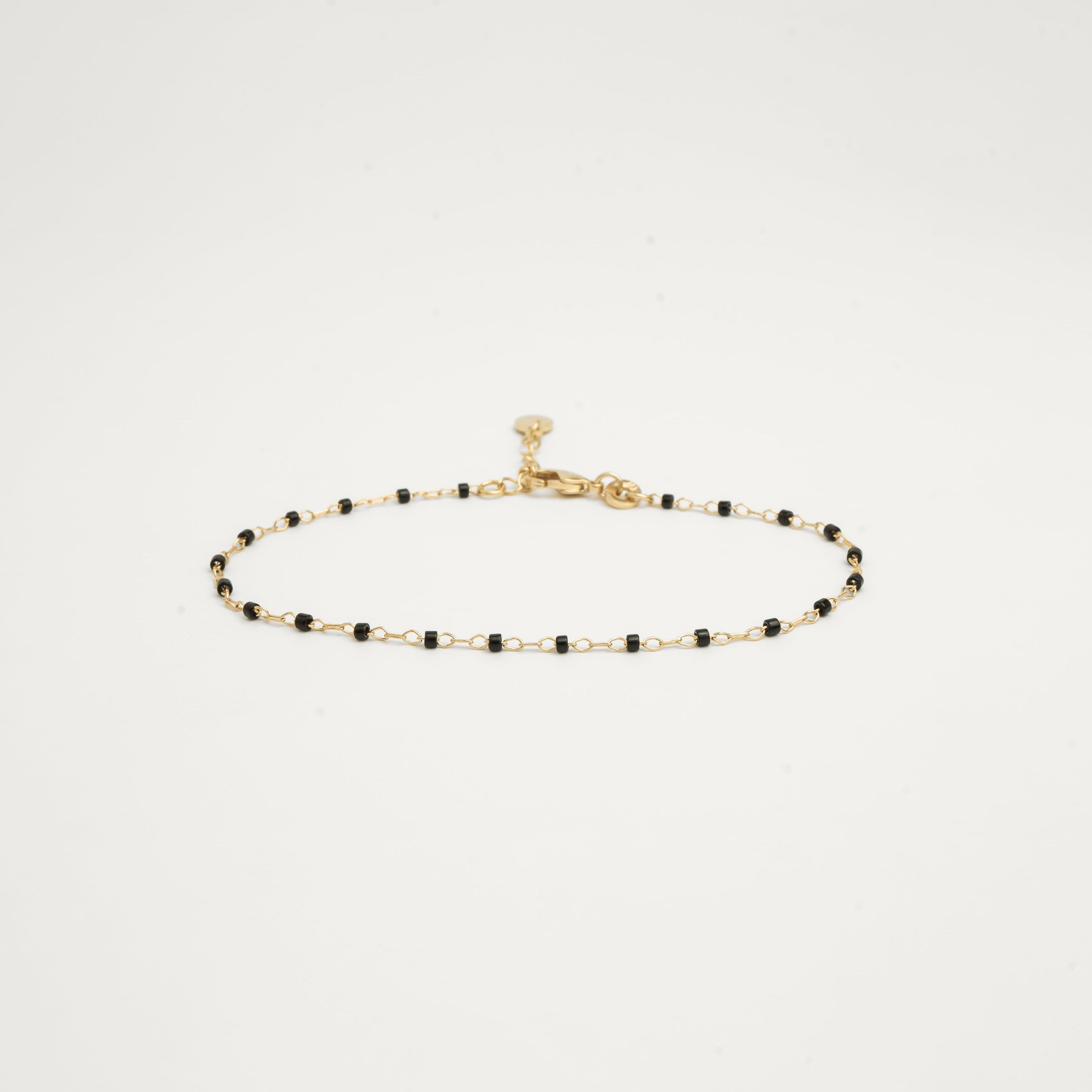 Bracelet perles noires plaqué or