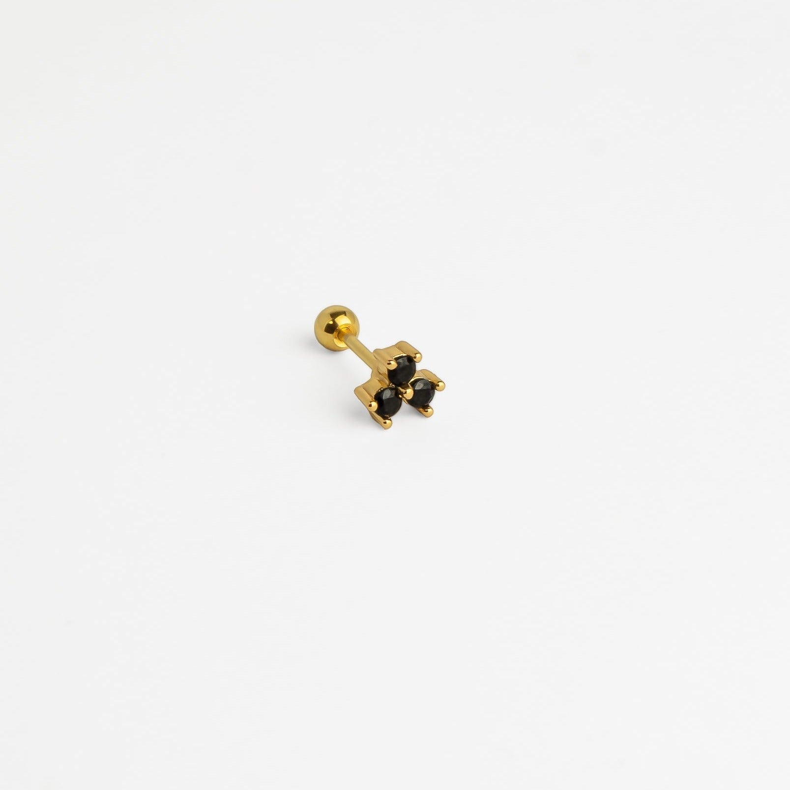 Piercing acier inoxydable doré pierres noirs